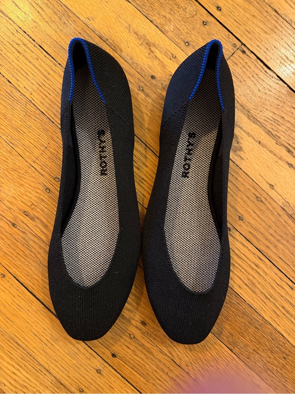 Rothy’s brand new Black Knit Ballet Flats with Blue Trim